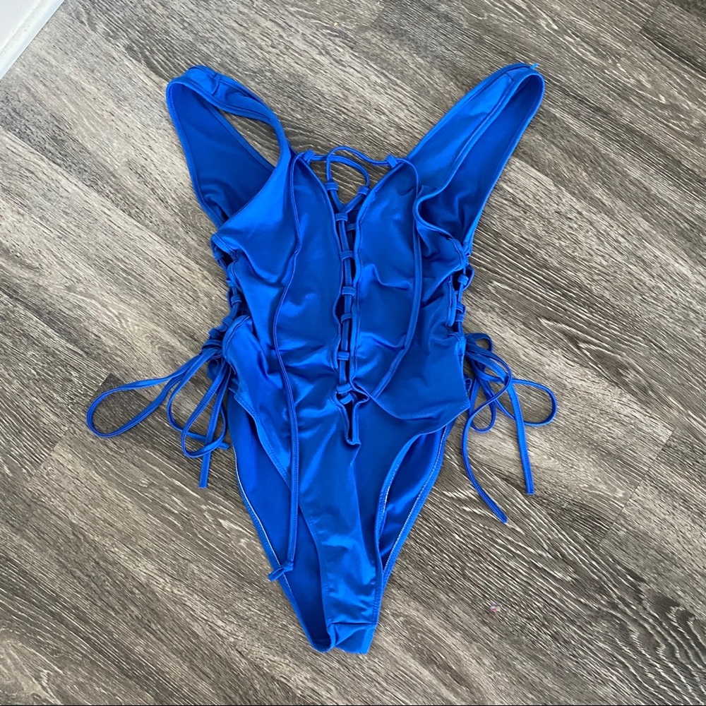 blue lace up one piece swim suit